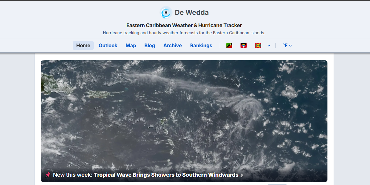 Dewedda.com homepage with the new at-a-glance headline across the bottom of the satellite image, reading "New this week: Tropical Wave Brings Showers to Southern Windwards"